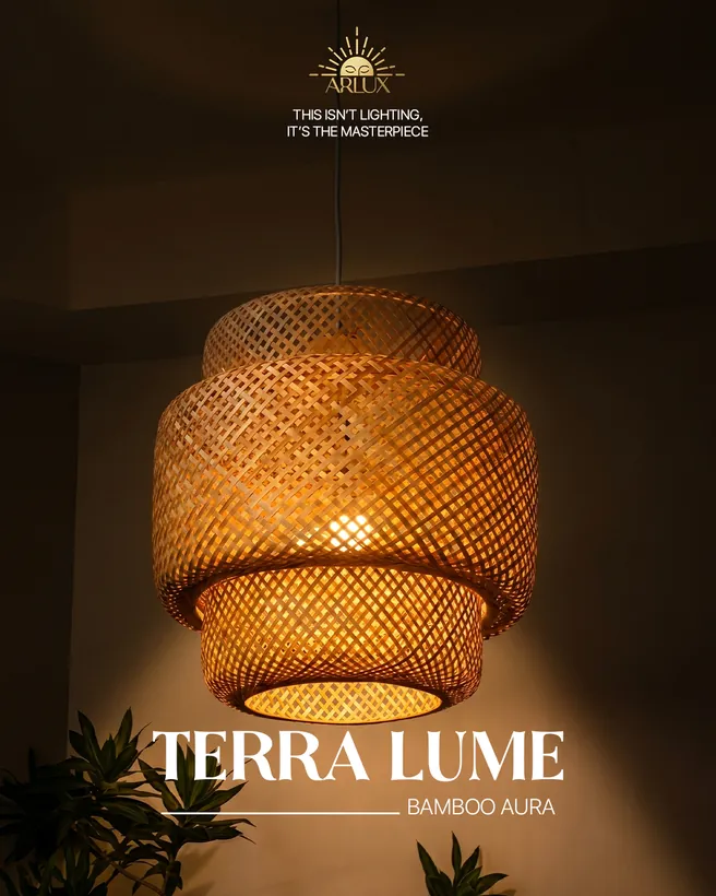 Arlux lighting: the TerraLume tiered pendant lit in a dark room beside a plant.