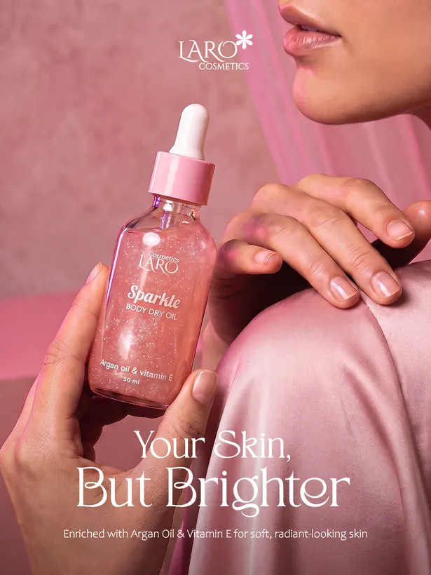 LARO campaign image: the Sparkle body dry oil held against pink satin, headline Your Skin, But Brighter.