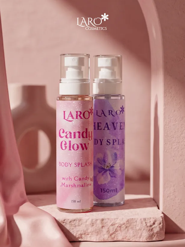 Product photograph: the Candy Glow and Heavenly body splashes side by side on a stone ledge.
